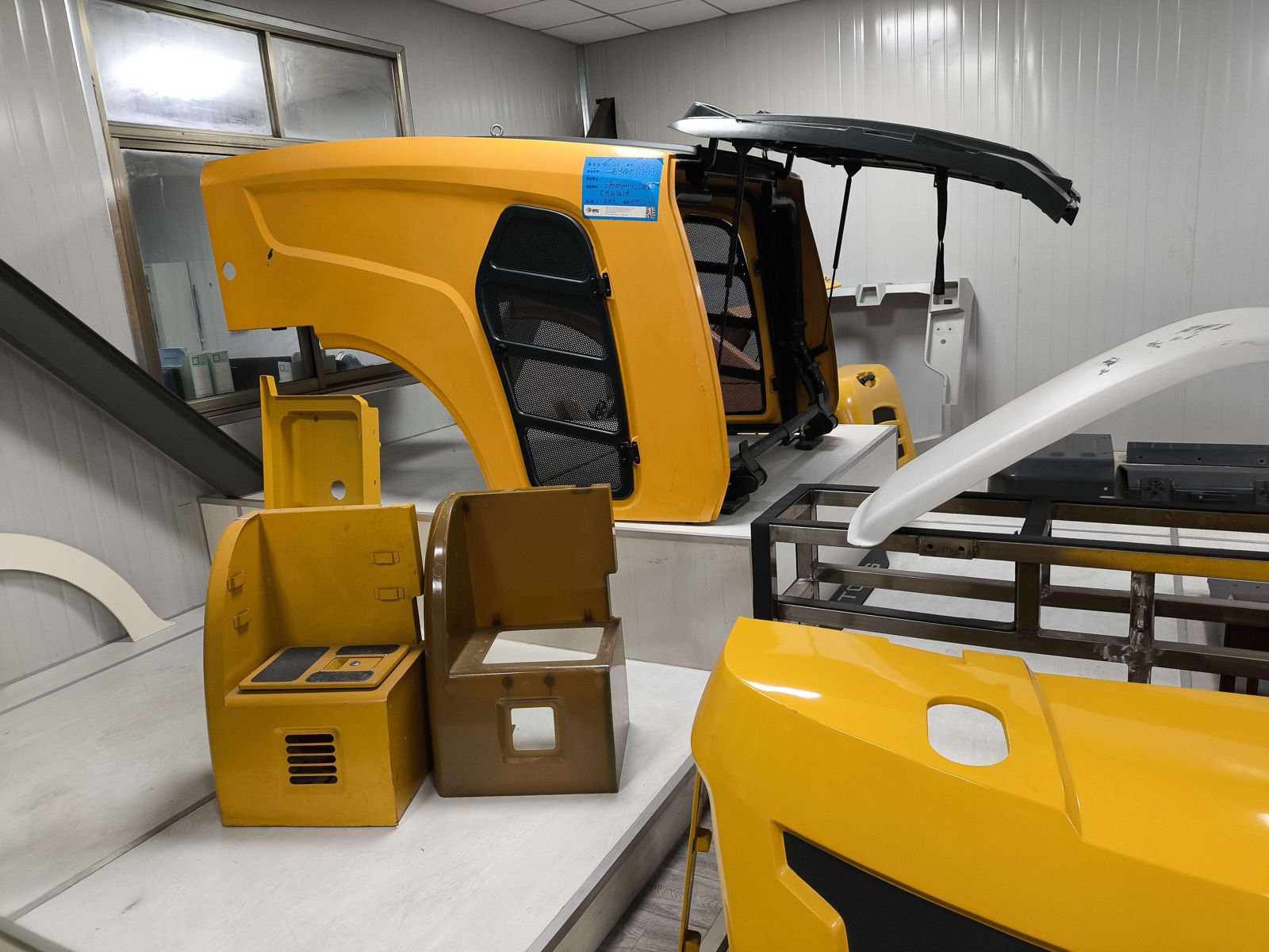 Painted PDCPD hoods and covers for construction equipment